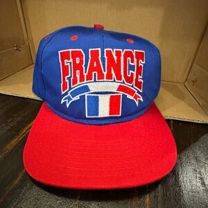 Blue and Red France Cap. Snap back one size.